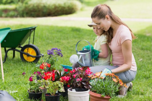 Training session showing correct use of garden equipment